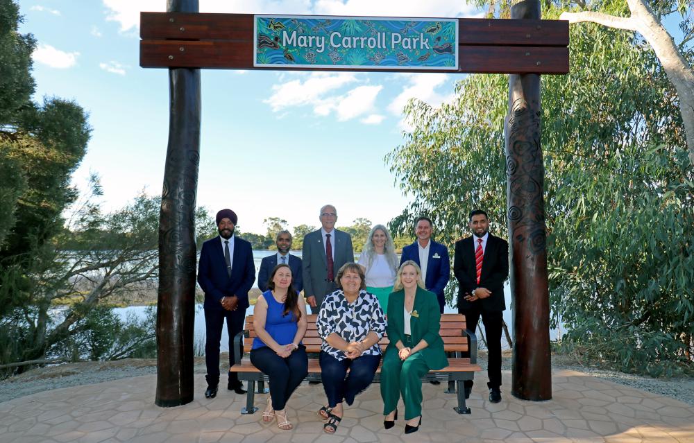 City of Gosnells Mayor Terresa Lynes, Deputy Mayor Serena Williamson and Councillors Balli Singh, Saiful Islam, Peter Abetz, Diane Lloyd, Leah Szczyglak, Aaron Adams and Malik Sajjad test out the new arch and seat at Mary Carroll Park.