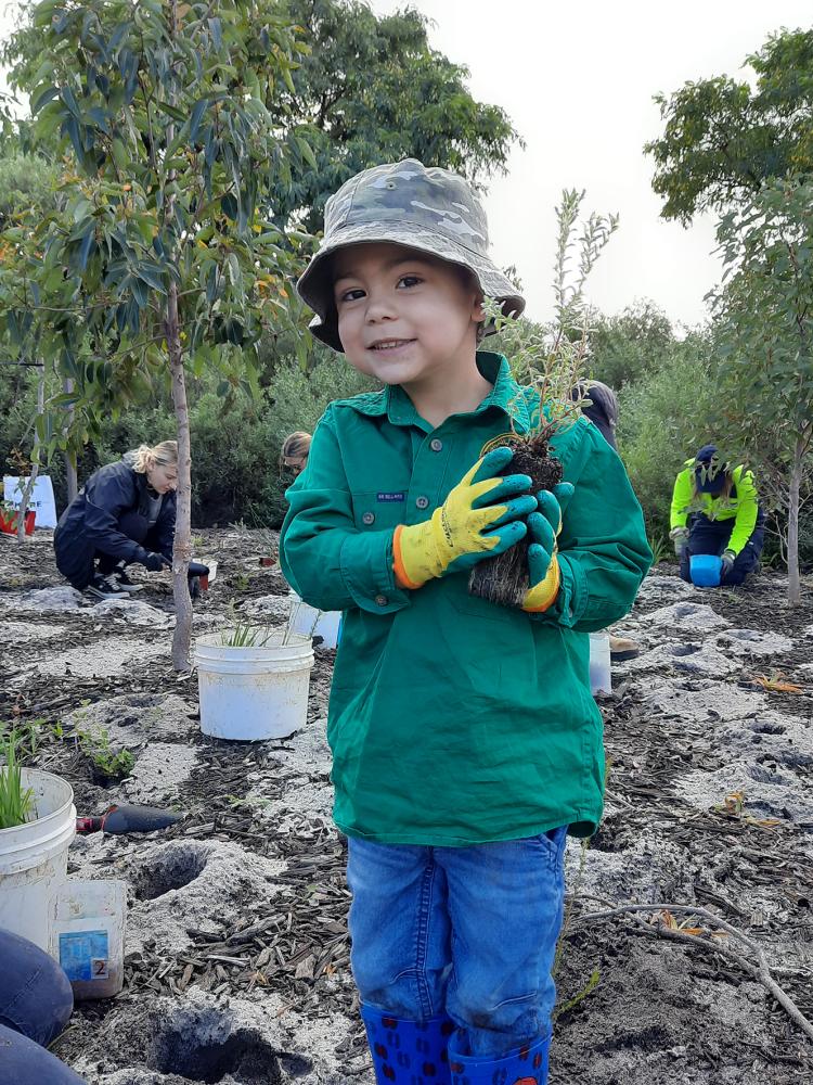 Caption – Jayden van Uden lends a hand at last year’s Give Our Bushland a Boost event