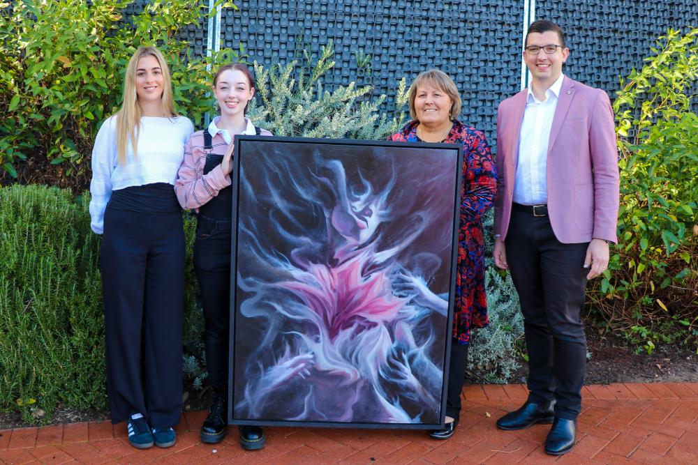 Casper Green with her winning art piece, alongside Mayor Terresa Lynes and Maddington Central sponsors.