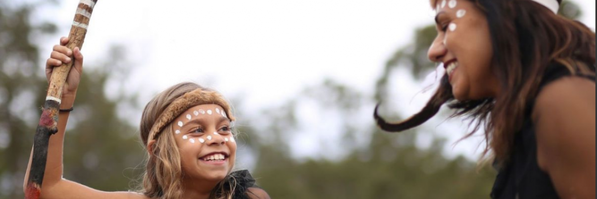 indigenous woman and child in traditional clothing