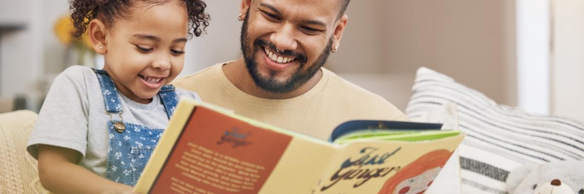 Dad reading to child