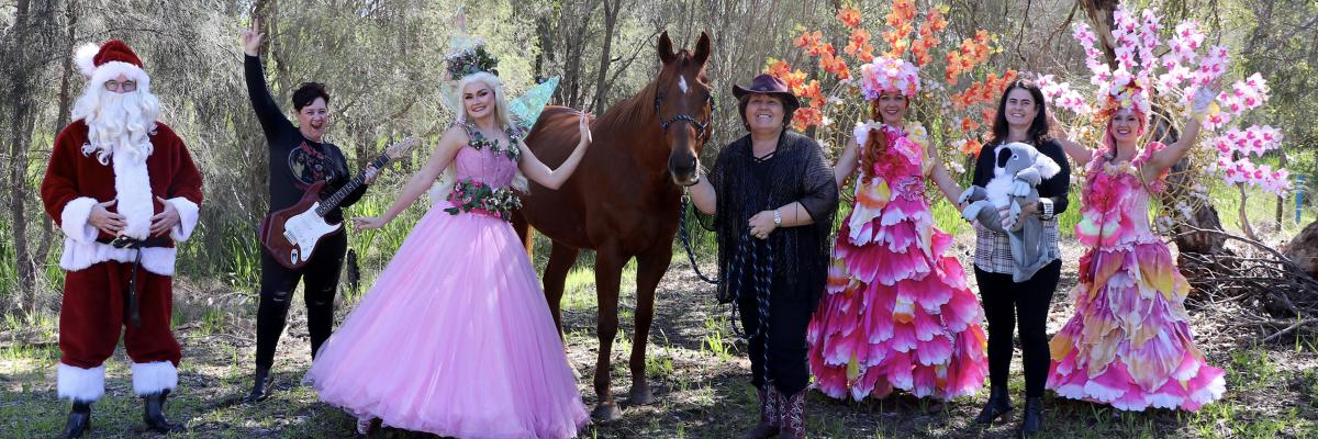 City of Gosnells Mayor (centre, with Ruby the horse), City staff and performers are ready for a magical season of free events for everyone in the community to enjoy