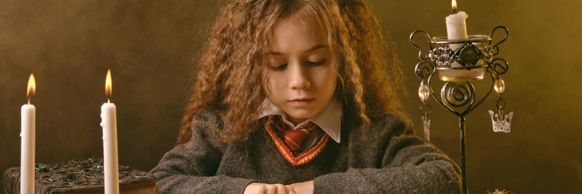 Child reading spell book 