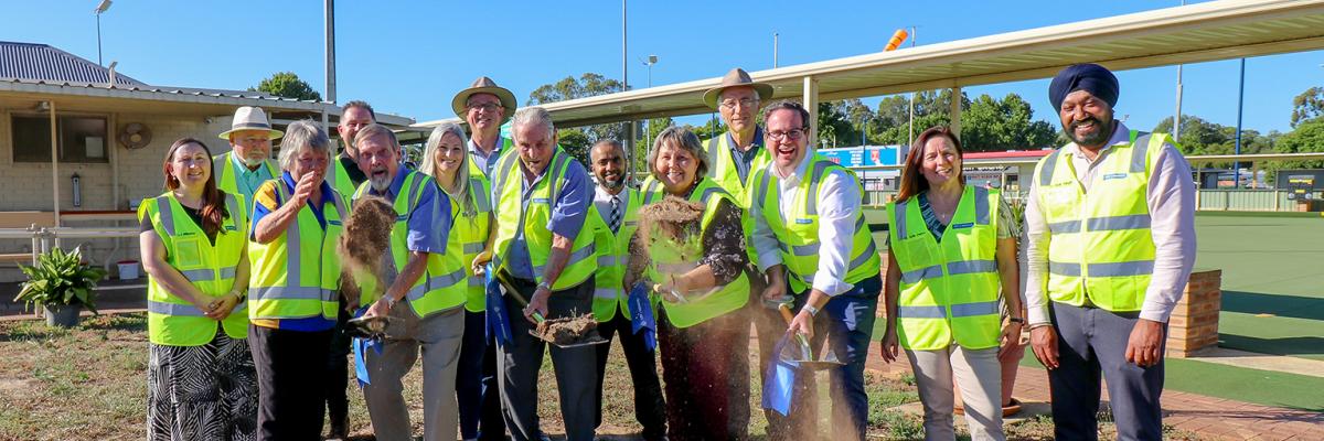 Mayor Terresa Lynes and Member for Burt Matt Keogh and Gosnells Bowling  Club representatives Peter Charkiewicz and Brian Fox turn the first sod for the new  clubhouse extension. They are watched on by Councillors Serena Williamson, Aaron  Adams, Diane Lloyd, David Goode, Saiful Islam, Peter Abetz, Kylie Dalton and Balli  Singh, with Gosnells Bowling Club President Hazel McGinty