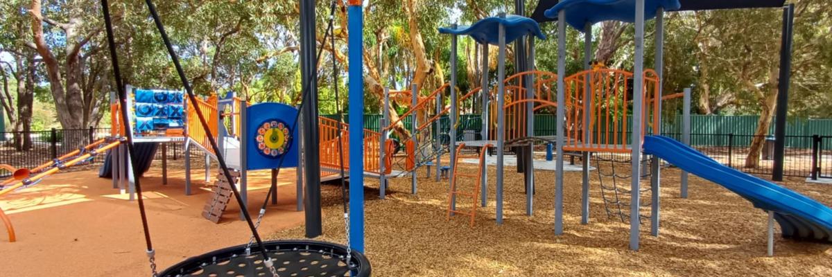 Boyle Playground with swing in foreground