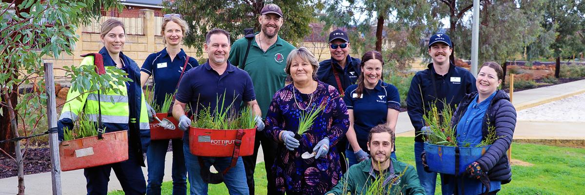 City of Gosnells Mayor Terresa Lynes, Councillor Aaron Adams, City staff, Armadale Gosnells Landcare Group members and WA Local Government Association staff prepare to plant native trees and understorey plants to improve tree canopy coverage in Canning Vale.