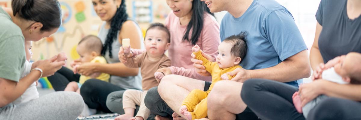 Parents and babies on the floor