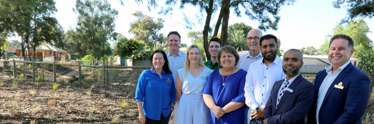 Mayor Terresa Lynes and Councillors, with Water Corporation Senior Planner Jeremy Maher, check out the living stream at Dunnell Park in Maddington