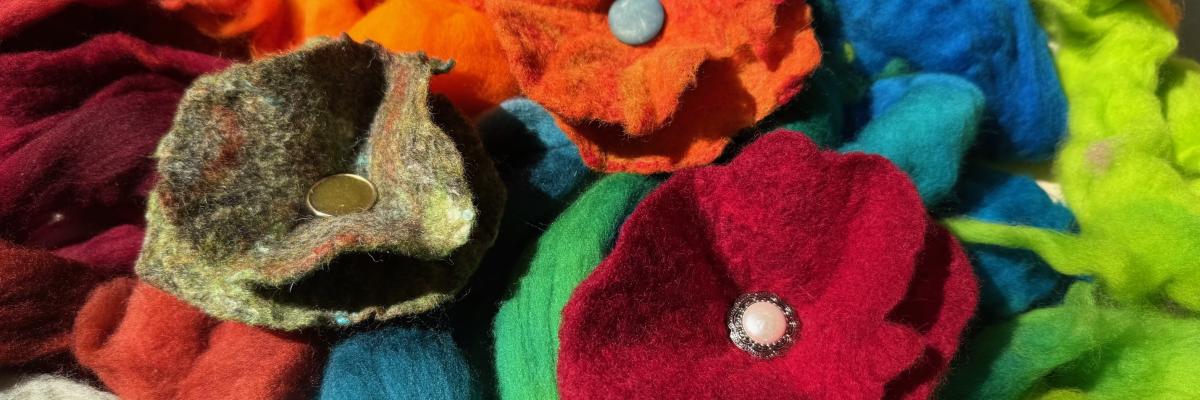 Felted flowers and colourful wool.