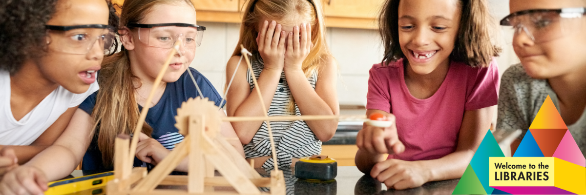 Kids building catapults.