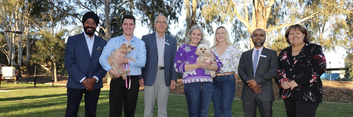 Mayor Terresa Lynes (right) and Councillors Balli Singh, Dillon Mason, Peter Abetz, Diane Lloyd, Leah Szcyglak and Saiful Islam at the new Oliphant Park enclosed dog park at Kenwick.