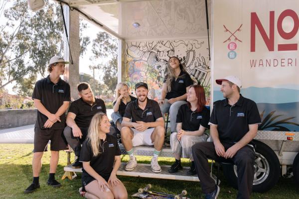 Youth Workers Socializing in pop up youth centre trailer