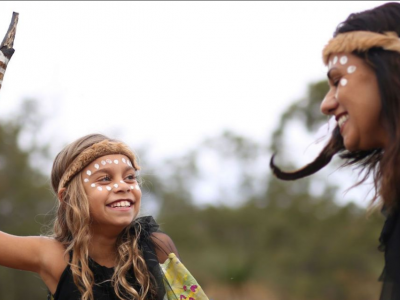 indigenous woman and child in traditional clothing