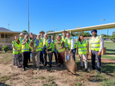 Mayor Terresa Lynes and Member for Burt Matt Keogh and Gosnells Bowling  Club representatives Peter Charkiewicz and Brian Fox turn the first sod for the new  clubhouse extension. They are watched on by Councillors Serena Williamson, Aaron  Adams, Diane Lloyd, David Goode, Saiful Islam, Peter Abetz, Kylie Dalton and Balli  Singh, with Gosnells Bowling Club President Hazel McGinty