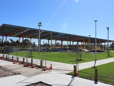 Image shows extensive undercover outdoor youth entertainment space