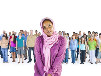 Young woman standing multicultural crowd