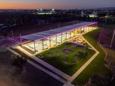 Aerial view of YES at night showing area under roof lit up