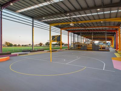 View under YES roof showing multi sports areas - netball, basketball and soccer goals