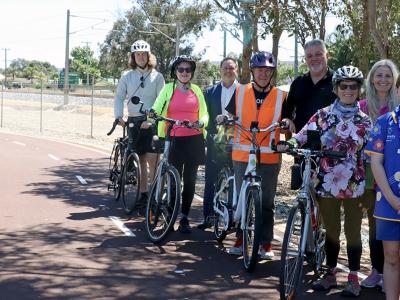 City of Gosnells Mayor Terresa Lynes, Councillors Aaron Adams, Glenn Dewhurst and Diane Lloyd, Gosnells Primary School students Lorelai Carthew and Scarlett Dallis, and GoBUG members Mary Russell, Matthew Turner, Jillian Woolmer and Graham Robinson explore the completed section of shared path along Seaforth Avenue in Gosnells.