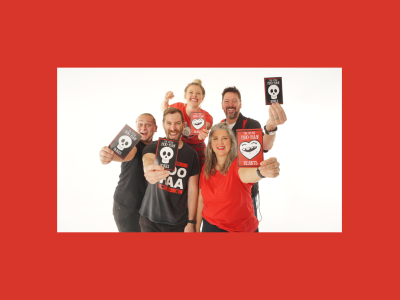 5 people stand showing off flyers for children's entertainment improv troup 'The Little Hoo Haa'.