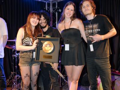 Cult of Humanity holding their 3rd Place Golden Record