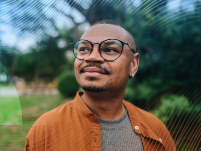 Man standing out in nature relaxed