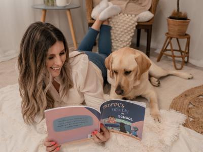Author reading to dog