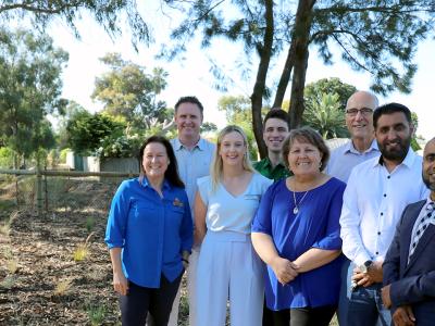 Mayor Terresa Lynes and Councillors, with Water Corporation Senior Planner Jeremy Maher, check out the living stream at Dunnell Park in Maddington