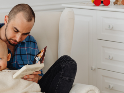 dad reading to baby